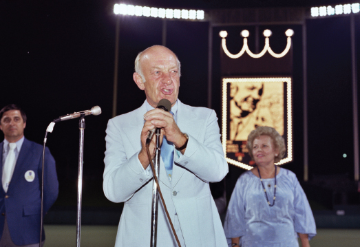 Ewing Kauffman takes the mic with his wife Muriel right beside him They - photo 9