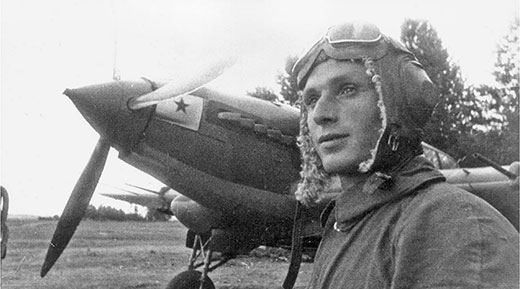 Squadron Commander Senior Lieutenant Valentin Kuzmin standing in front of his - photo 2