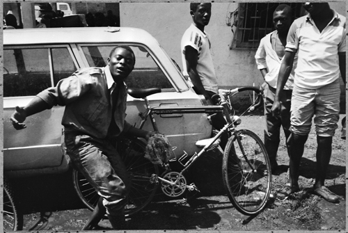 The Jazz Singer washing my bike Foumban The unpaved road Somewhere in - photo 12