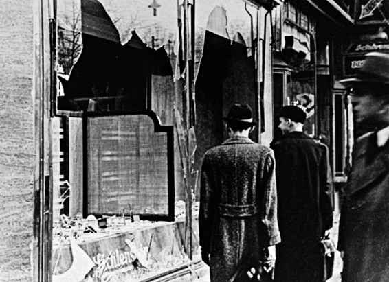 Broken windows following Kristallnacht On 1 September 1939 Germany invaded the - photo 2