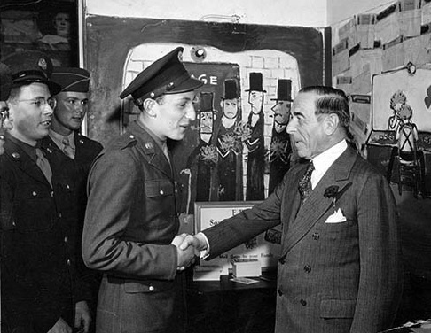 Lee Shubert greeting a soldier at the Stage Door Canteen during World War II - photo 5