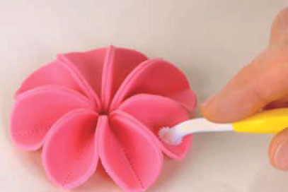 3 Take a quilting tool and run the wheel down the centre of each petal to add - photo 17