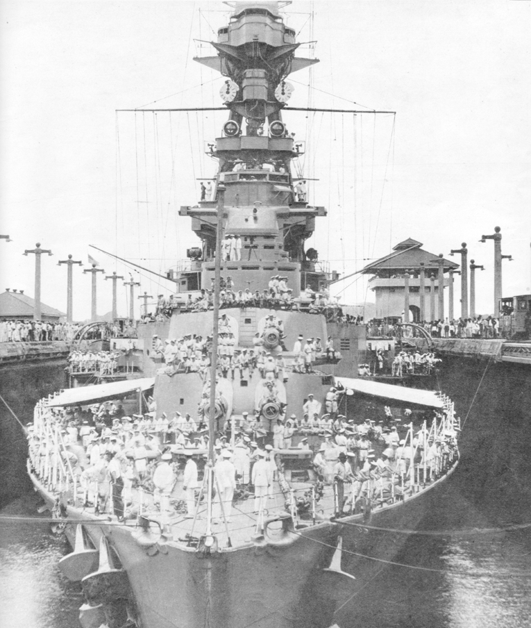 Officers and men on the forecastle of HMS Hood as she passes through the Pedro - photo 2