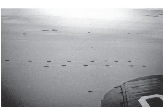 Taken from Ensign Laneys VF-53 Corsair this photograph shows the landing craft - photo 4