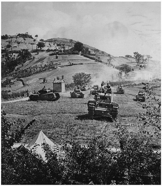 Visible are at least eight British Churchill tanks After fighting against the - photo 1