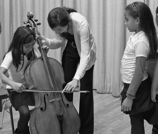 Beginning cellist with teacher Harmony Program 2010 Stephen Pile - photo 19