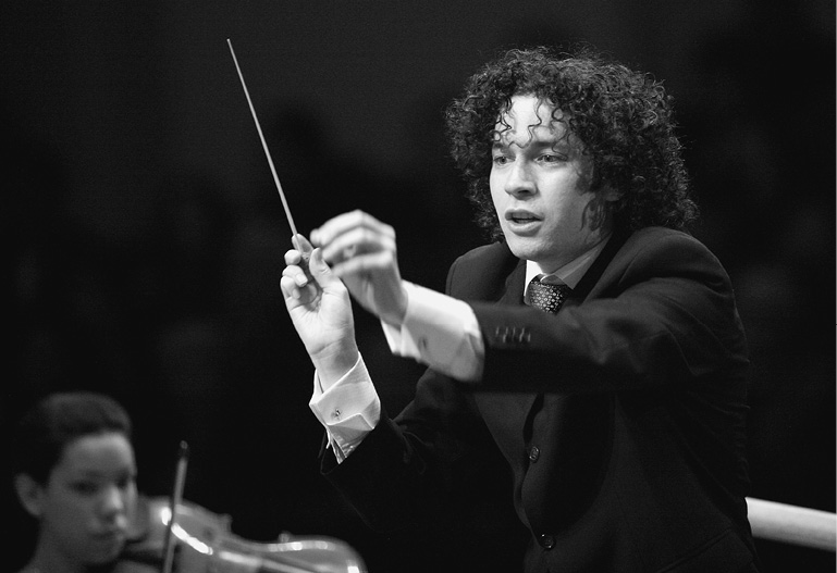 Dudamel conducting the Simn Bolvar Youth Orchestra at Carnegie Hall 2007 - photo 28