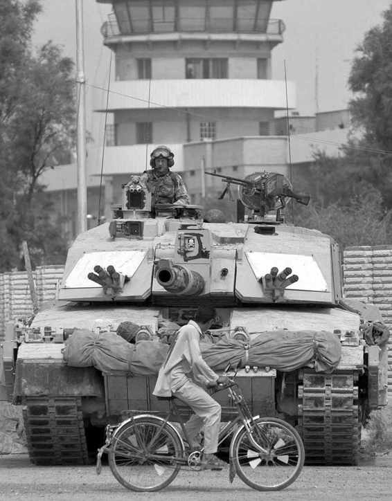 A Challenger 2 on the streets of Basra Iraq The demeanour of the local on the - photo 1