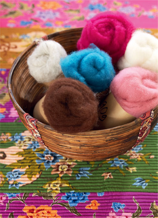 A basket filled with pretty colored yarn adds a nice touch to your home - photo 8