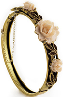 A vintage gold bracelet with porcelain flowers given to Janie by January - photo 5