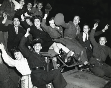 Allied soldiers and French civilians in Paris celebrated victory in Europe May - photo 3