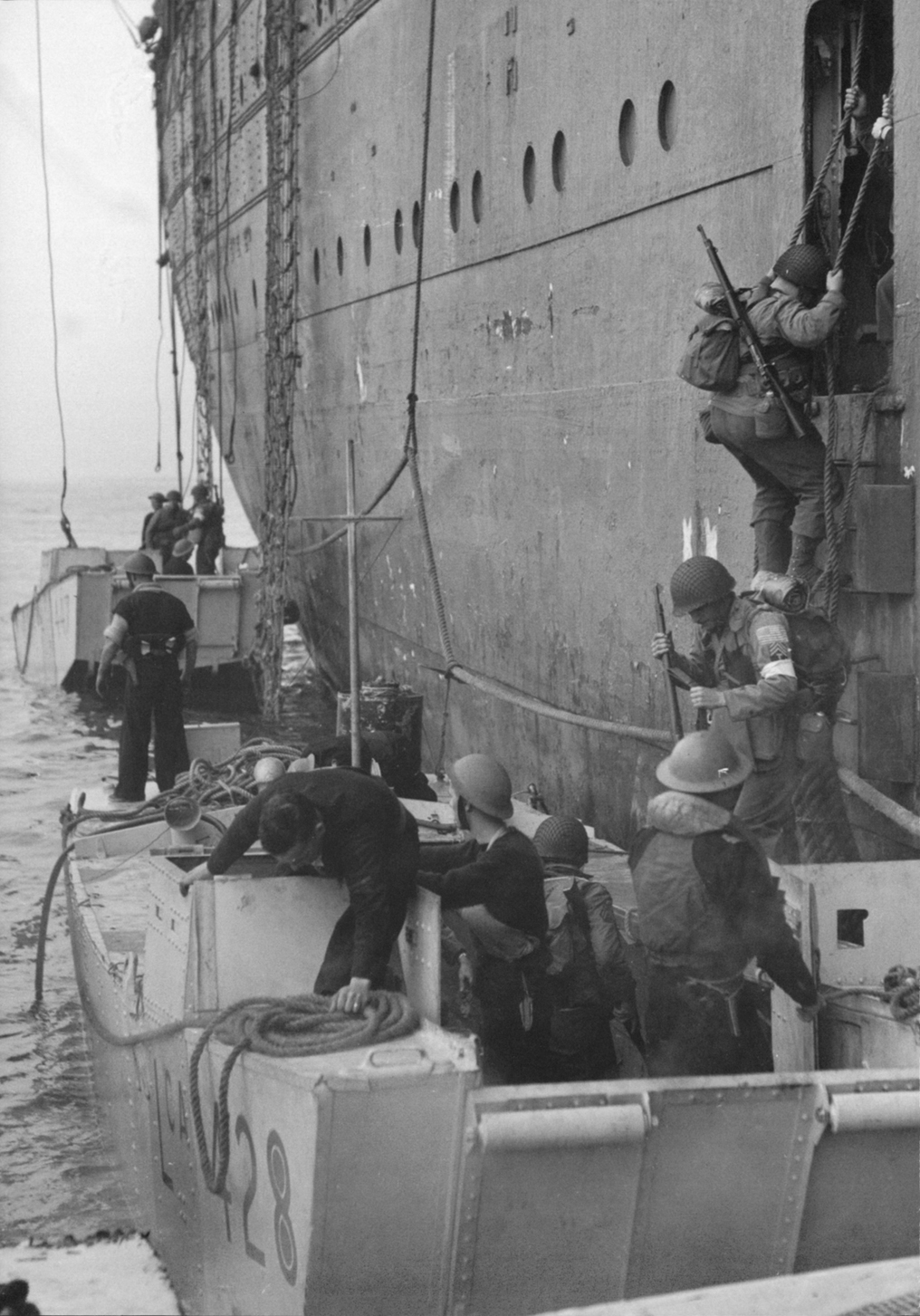 American troops embarking into an LCA from a liner during the North Africa - photo 1