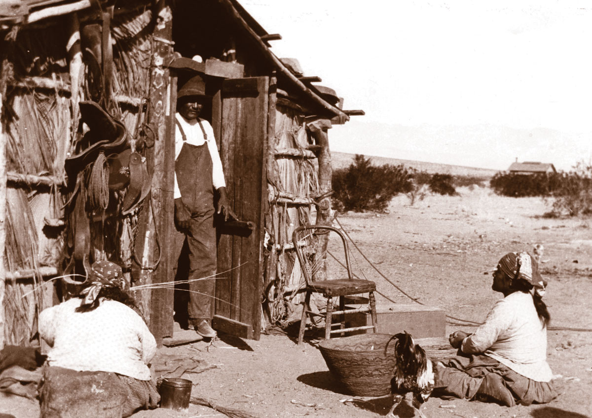 Pedro Chino in the doorway of his home in 1898 Wife Marie on the left weaves - photo 7