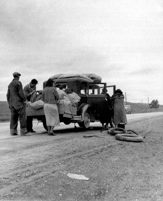 A migrant family of Mexicans on the road with tire trouble February 1936 - photo 2