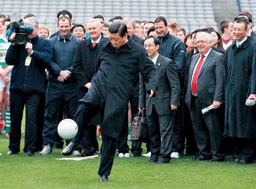 Kicking off a ball during his visit to the Gaelic Athletic Association in - photo 14