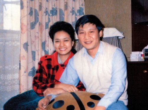 With his wife Peng Liyuan September 1989 Cycling with his daughter Mingze - photo 15