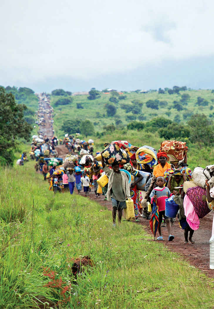 Refugees from the Democratic Republic of Congo DRC try to escape violence - photo 3