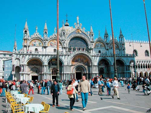 Exotic inside and out St Marks Basilica sports bulbous domes topping a - photo 13