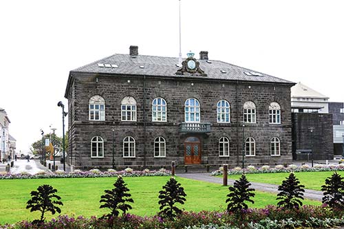 Reykjavks Parliament House northern lights appearing in the west In summer - photo 10