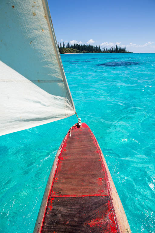 Pirogue outrigger canoe approaching New Caledonias le des Pins SEBASTIEN - photo 8