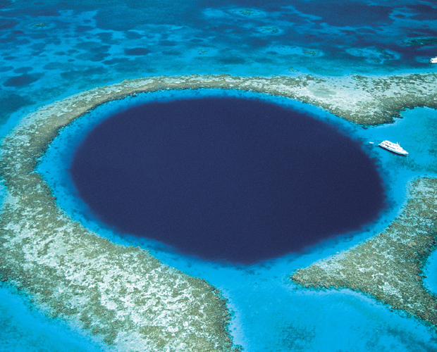 KEVIN SCHAFER GETTY IMAGES The sheer walls of the Blue Hole Natural - photo 7