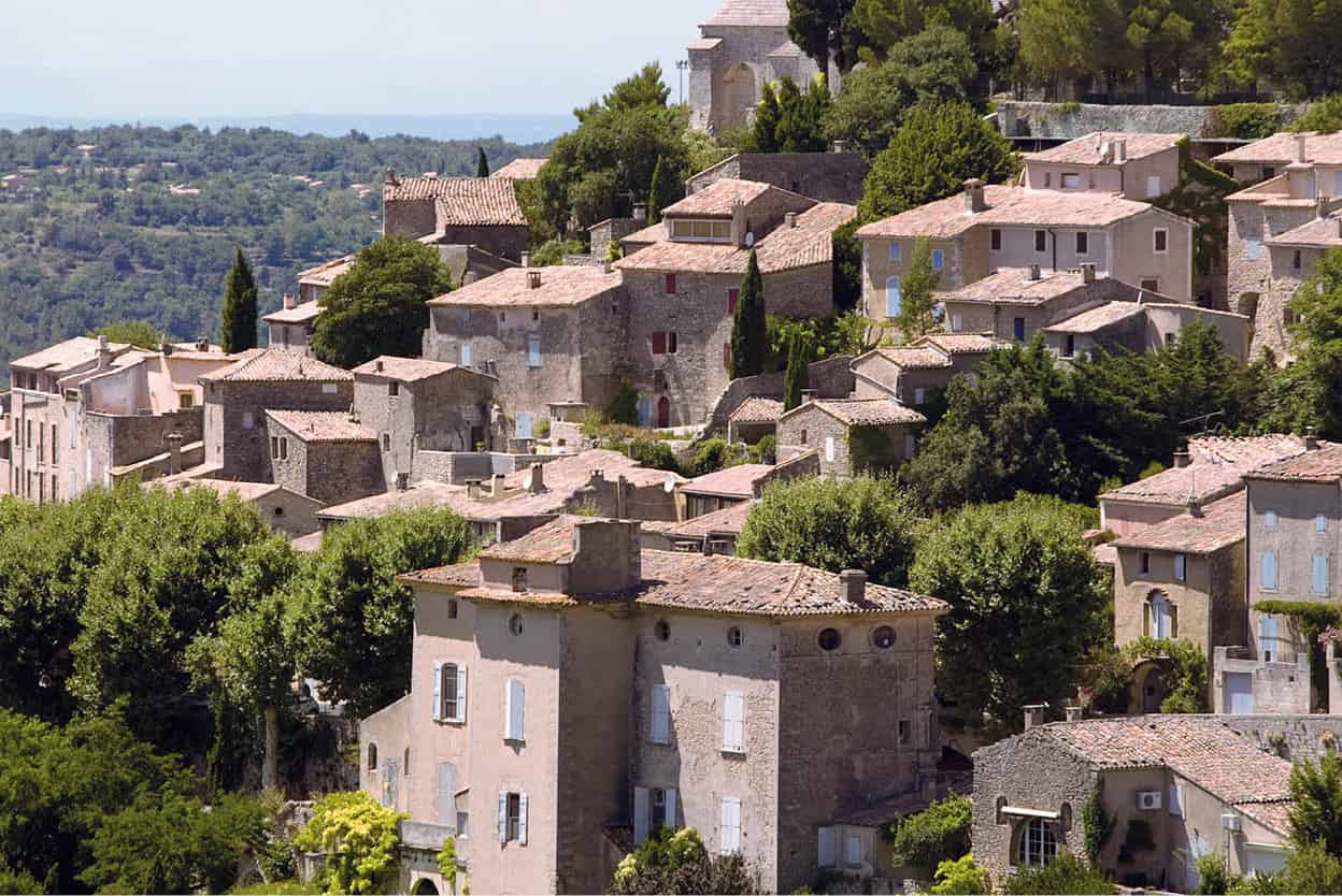 The Luberon Oak woods vines and the quintessential hill villages of - photo 10