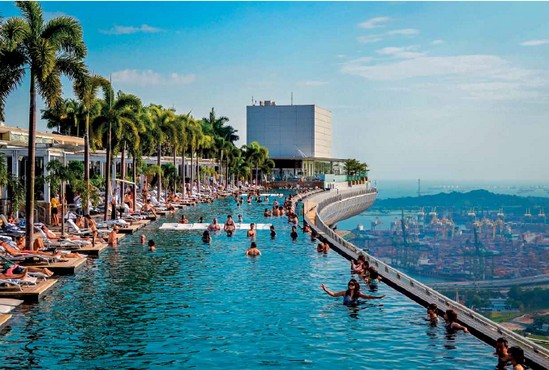 The infinity pool on the 57th floor at Marina Bay Sands is the highest and - photo 7