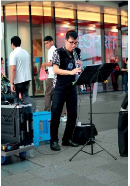 Buskers in Singapore showcase their skills outside shopping malls MRT stations - photo 10