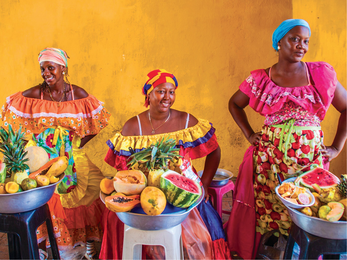 Seen here at Plaza de los Coches colorfully clad Palenquera fruit-sellers are - photo 7