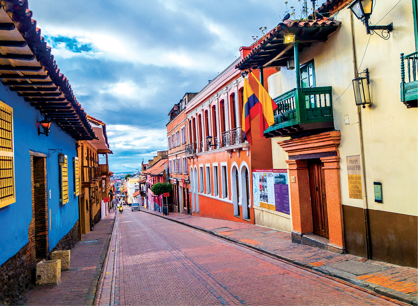 Colorful La Candelaria Bogots colonial quarter is home to most of the citys - photo 8