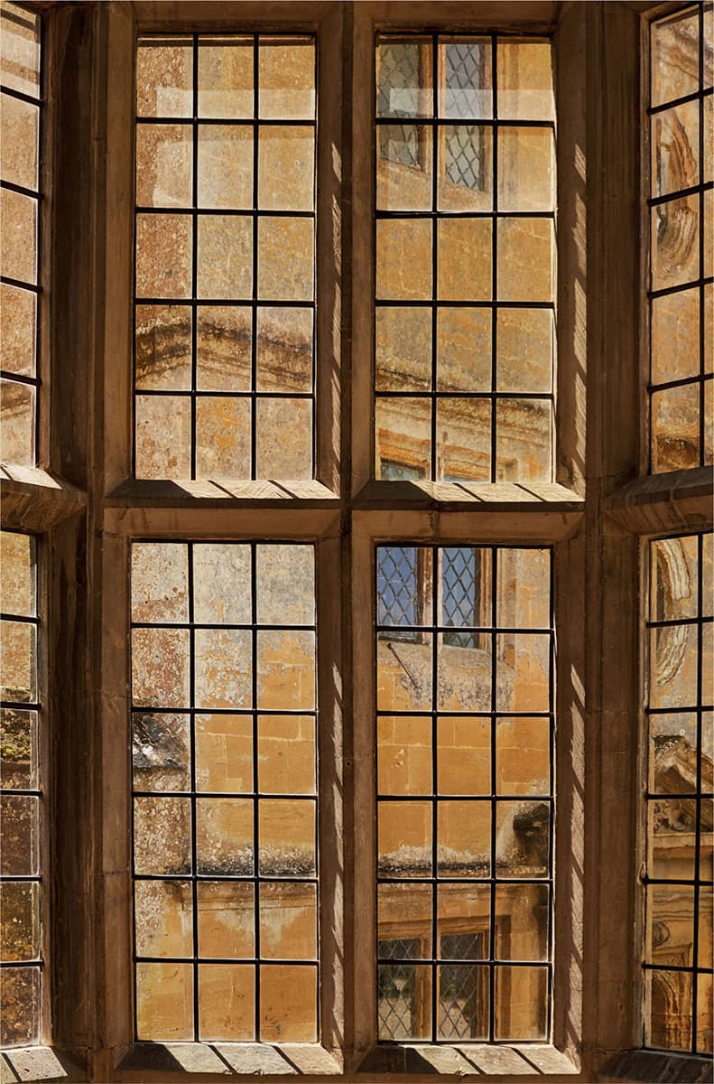 The golden light of Stanway looking at the gatehouse through the oriel window - photo 3