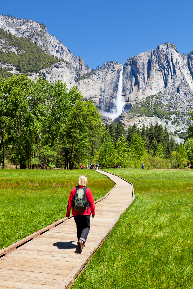 Yosemite National Park Hiker walking towards Yosemite Falls NEALE CLARK - photo 9