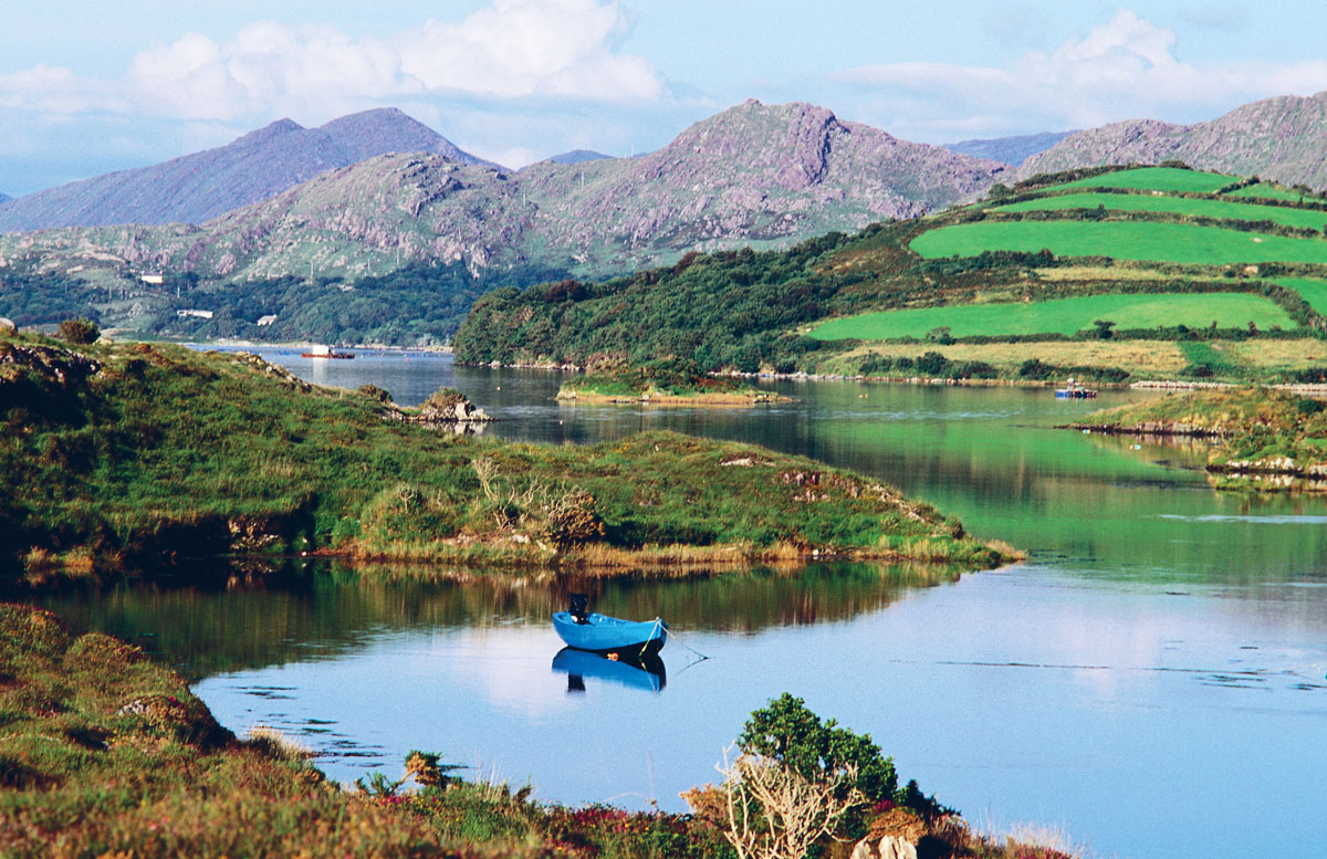 Kenmare River A boat floats on tranquil waters JOHN BANAGANGETTY IMAGES - photo 5