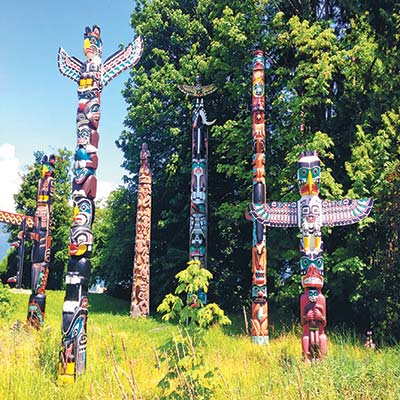 First Nations totem poles in Vancouvers Stanley Park Seattle Space Needle - photo 9