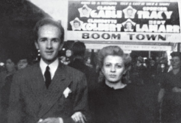 Rose and Roger Ridder walk past the Park Theater marquee in downtown - photo 4