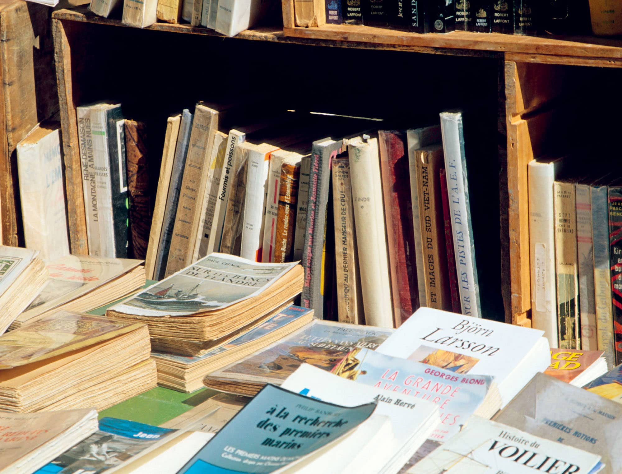 Crowded bookshelves in the book town of Becherel France BOOK TOWNS - photo 2