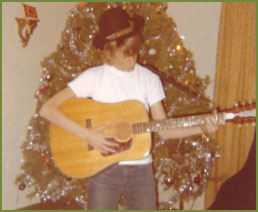 Christmas morning with my first guitar Joey at her high school graduation - photo 8