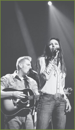 Joey and me singing for the first time on stage at the Grand Ole Opry With - photo 18