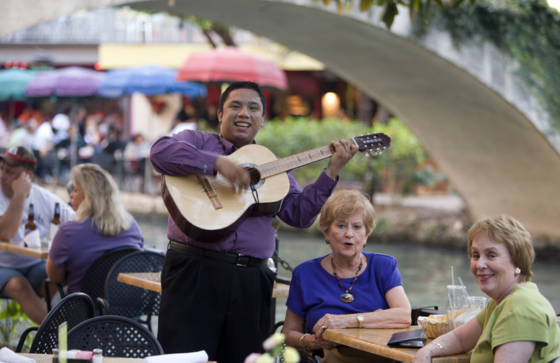 Mariachi musician at a cafe Lined with colorful cafs the beautiful Paseo del - photo 3