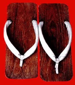 A pair of wooden geto slippers at the venerable Tawaraya Inn which has been - photo 2