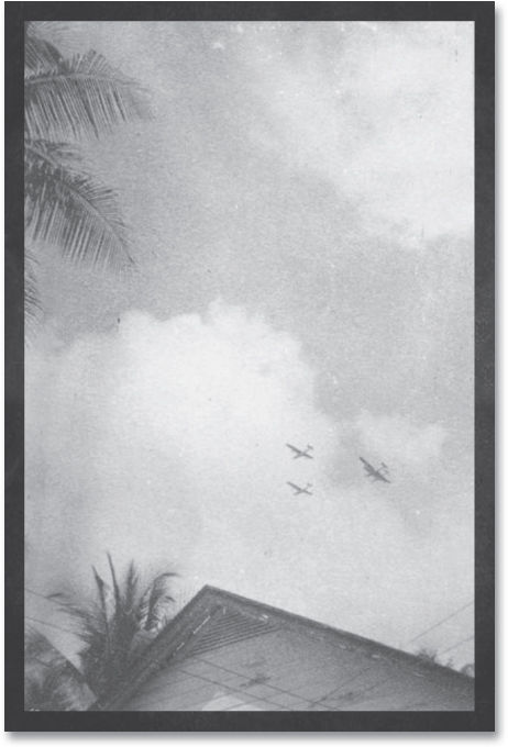 A photograph of the first Japanese air raid on Australian-controlled territory - photo 2