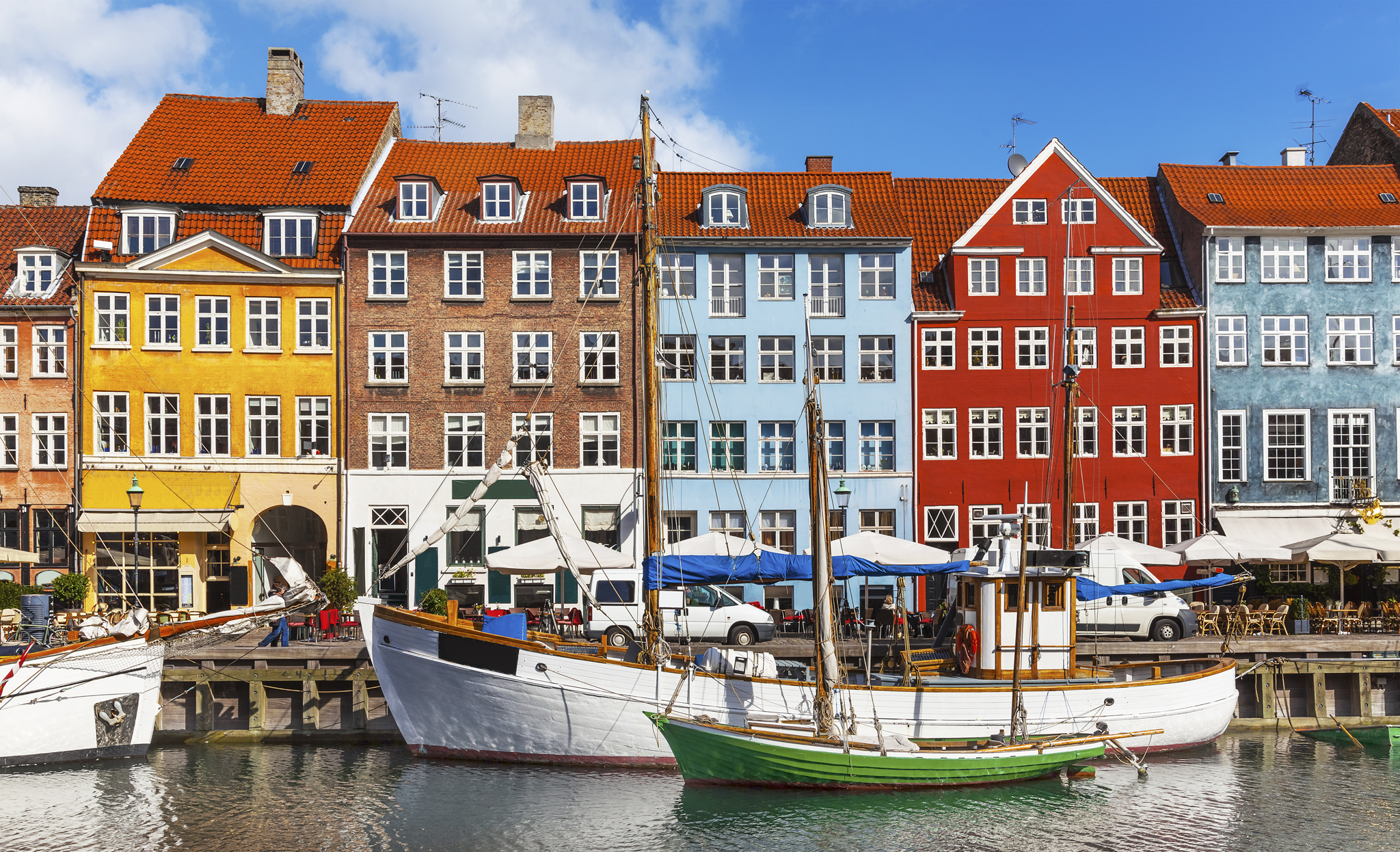 Fishing boats on the water in the historic district of Nyhavn Top 10 - photo 7