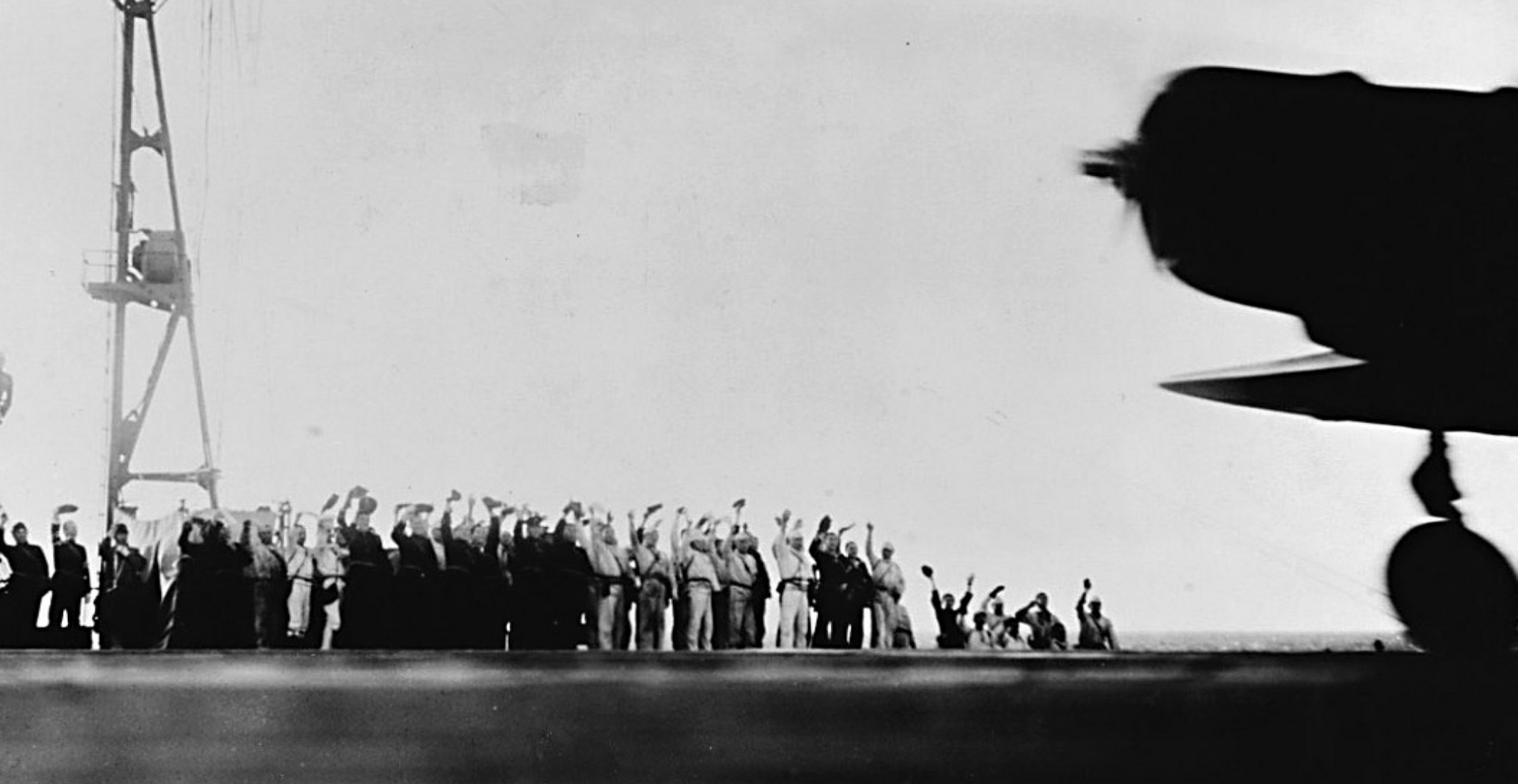 A Japanese navy carrier attack plane takes off for Pearl Harbor as its crewmen - photo 8