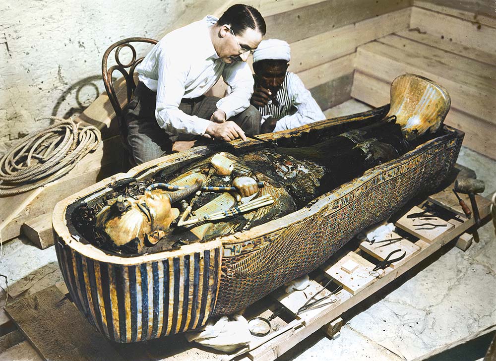 The archaeologist Howard Carter examines the coffin of the Egyptian pharaoh - photo 4