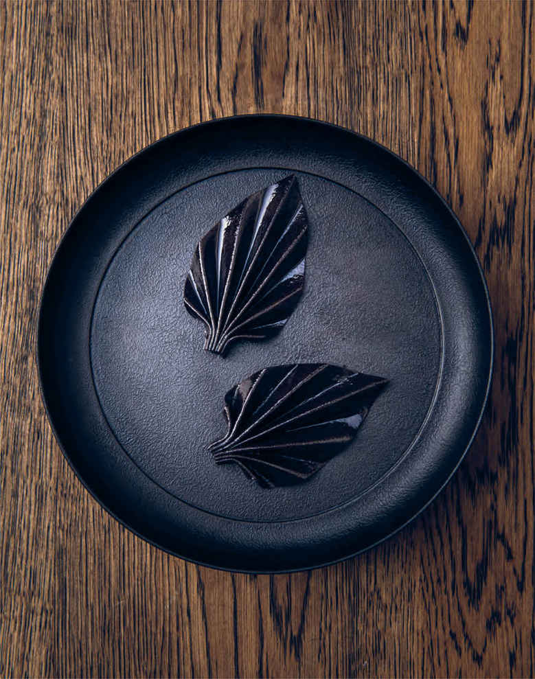 Garlic Flower Noma Japan 2015 The origami-like petals are a puree of black - photo 6