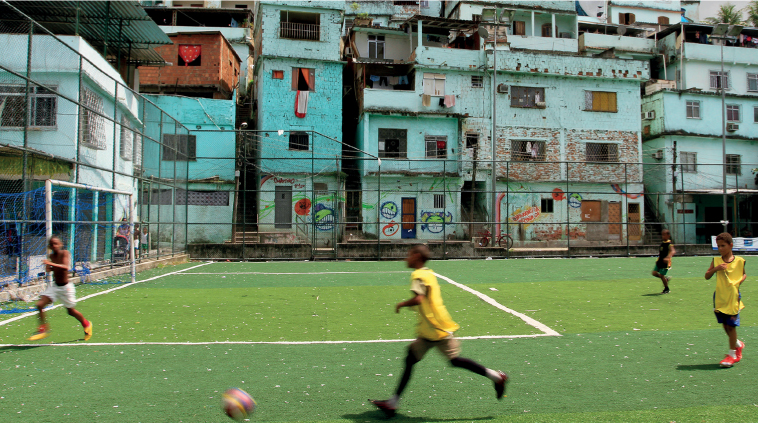 iStock BOYS PLAYING FOOTBALL FAVELA MORRO DA MINEIRA IN RIO DE JANEIRO Where - photo 5