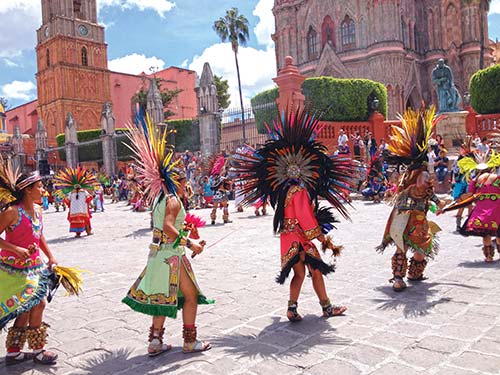 traditional dancers in the central plaza in San Miguel San Miguel is a - photo 11