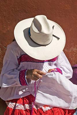 artisan embroidering in Tequisquiapan Parroquia de San Miguel Arcngel - photo 13