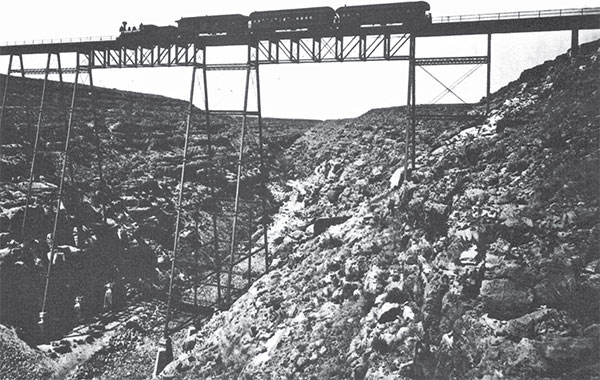 A Santa Fe passenger train rolls over the Canyon Diablo during the 1880s - photo 5