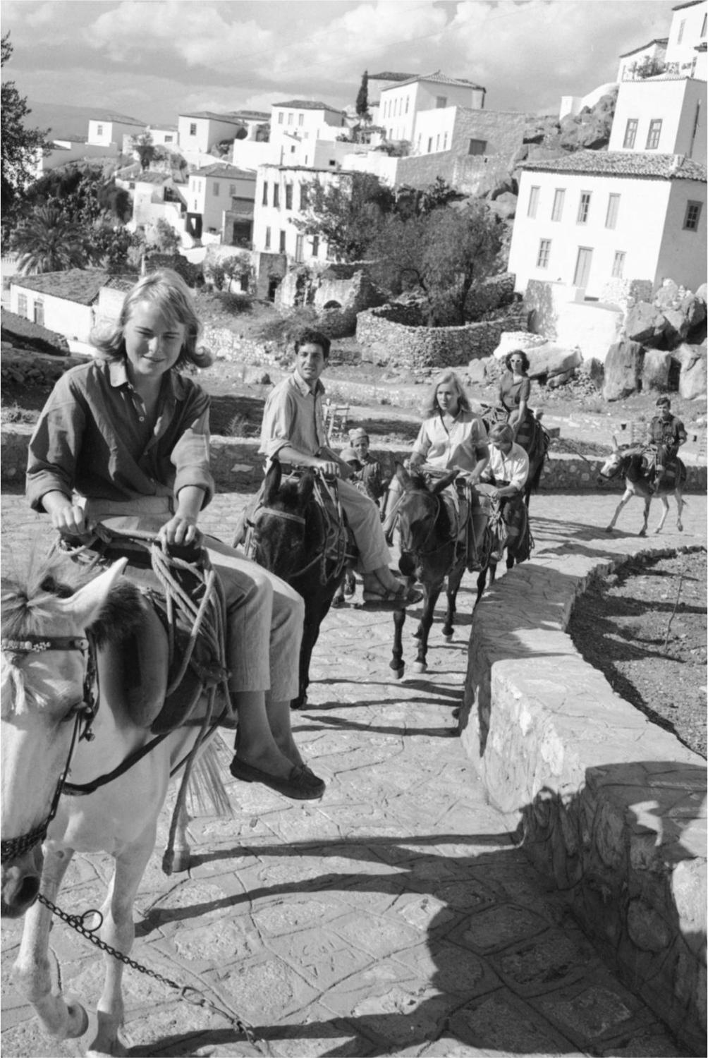 Marianne Ihlen followed by Leonard and others on a mule ride in Hydra 1960 - photo 7